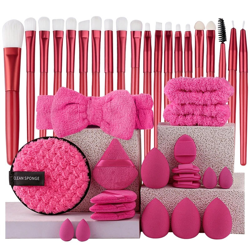 Red makeup brush set with matching sponges and headband