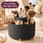 Alsunu 360 degree rotating makeup organizer in black with gold feet, filled with brushes and lipsticks