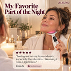 Woman using the LED massager on her jawline at an evening vanity, with a 5-star customer review