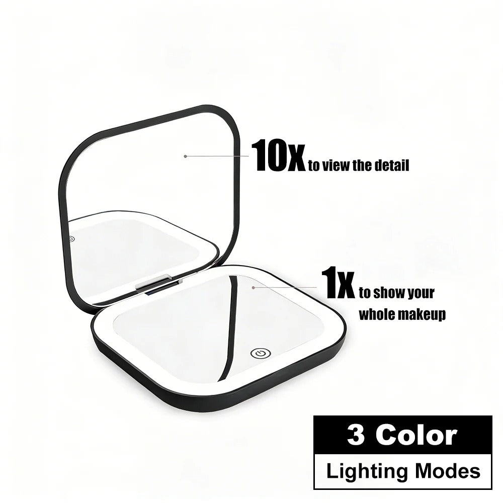 Black compact mirror with 10X magnifying side and 1X full view side