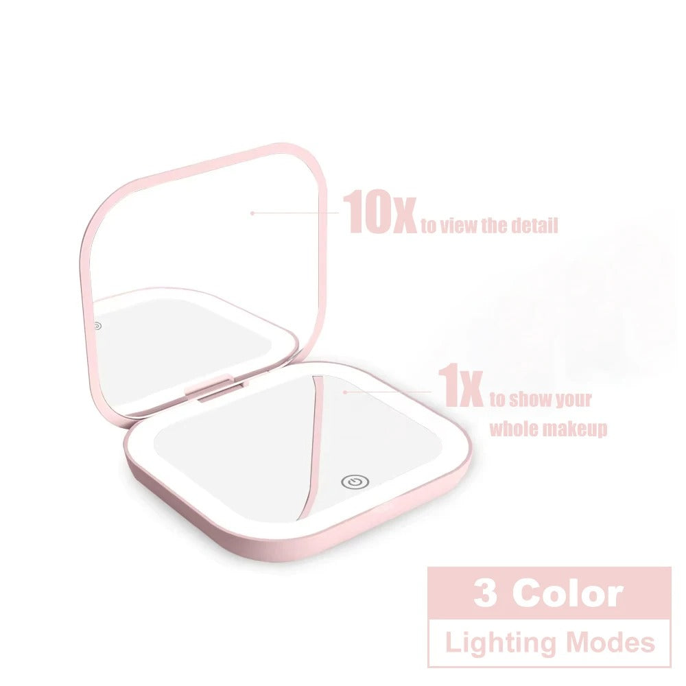 Pink compact mirror with 10X and 1X mirrors and three lighting modes